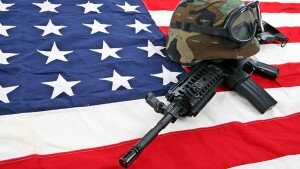 Gun, helmet, and U.S. flag