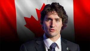 Justin Trudeau against a backdrop of the Canadian flag